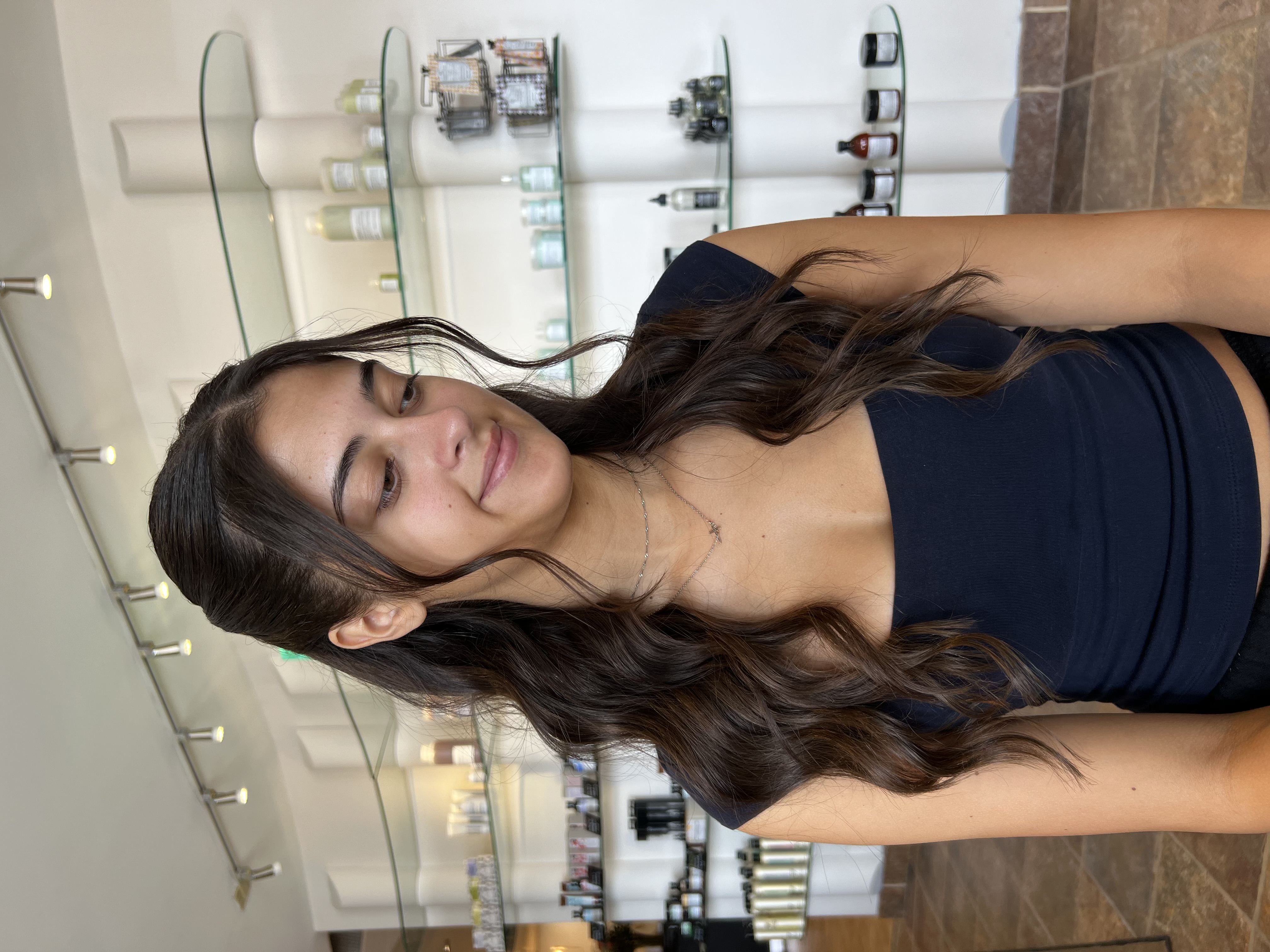 Long brunette waves, side portrait