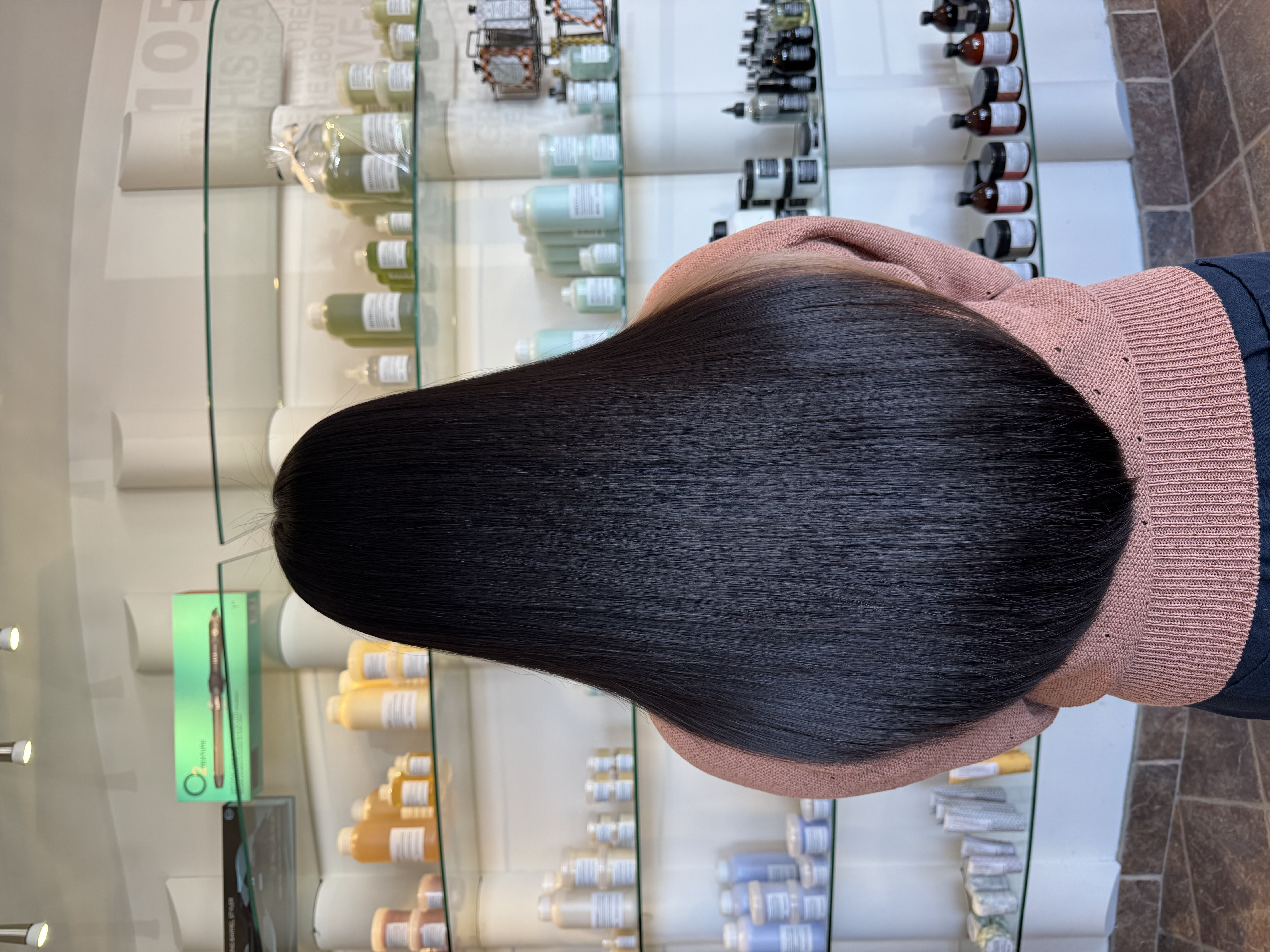 Glass-straight jet black hair