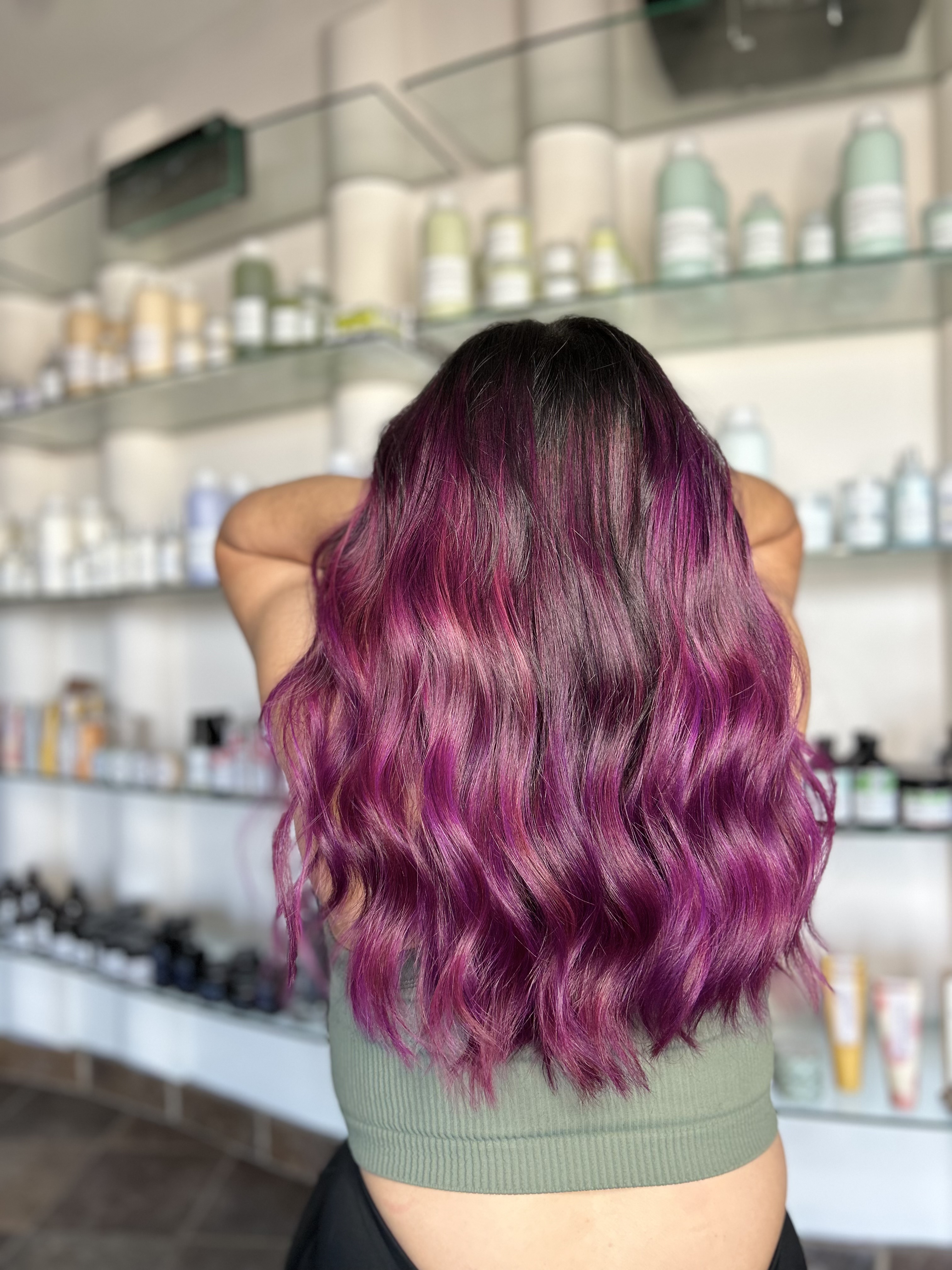 Magenta balayage waves with dark roots