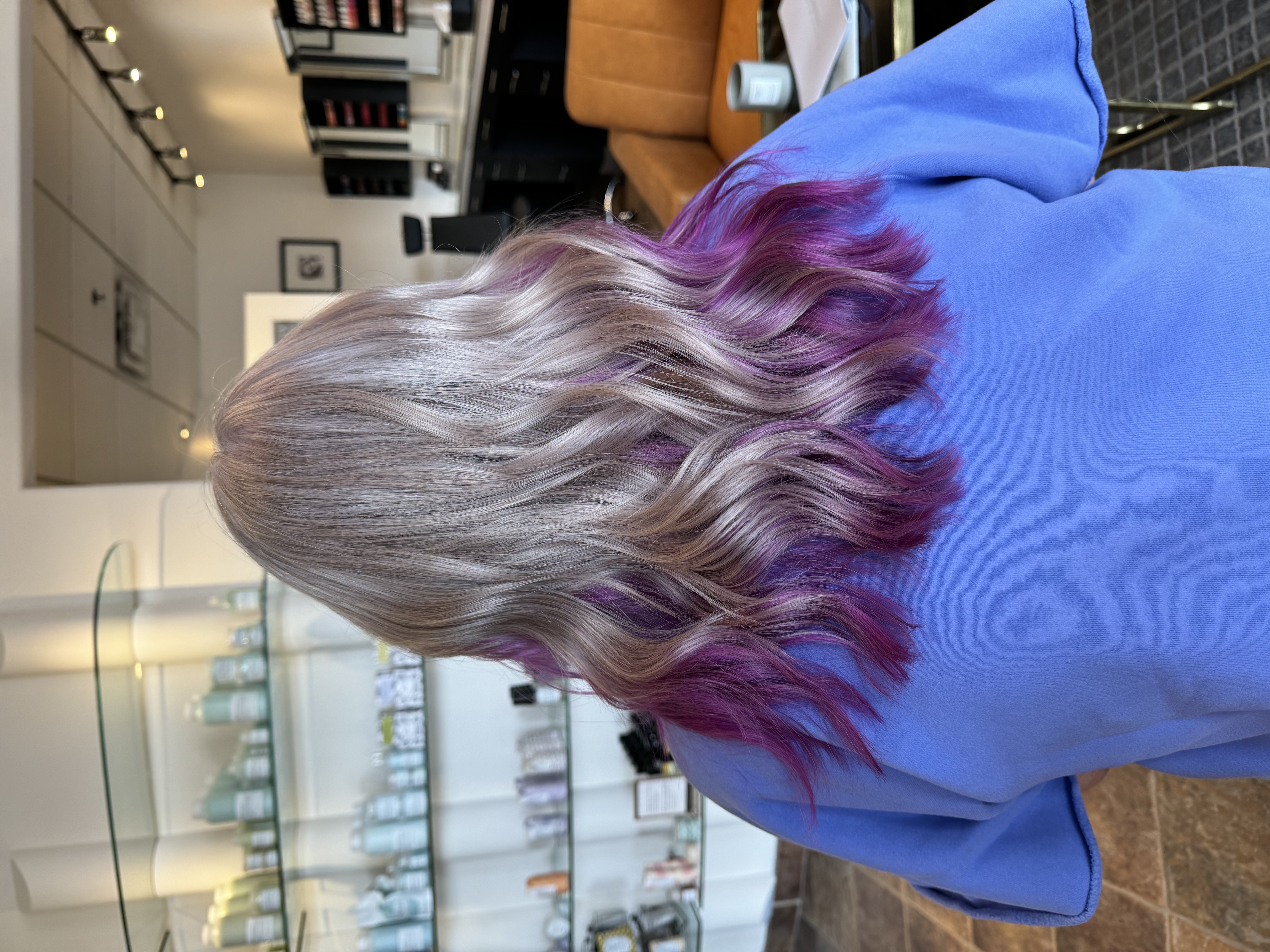 Platinum blonde with magenta peekaboo underlights