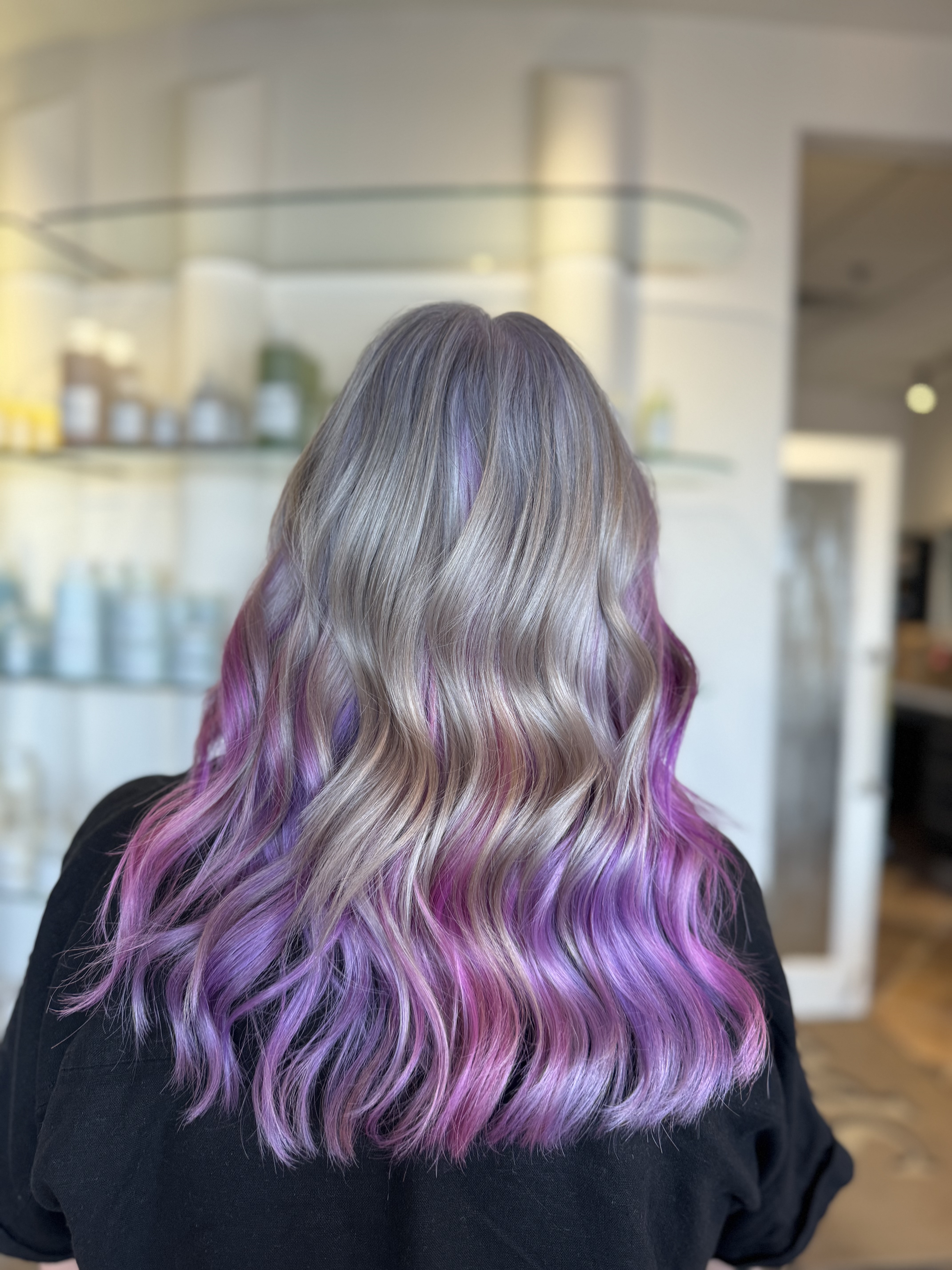 Silver blonde waves with lavender underlights